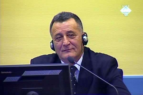 Milan Tupajic in the courtroom