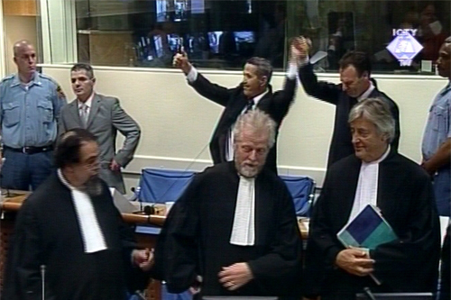Isak Musliu, Haradin Bala and Fatmir Limaj during the sentencing