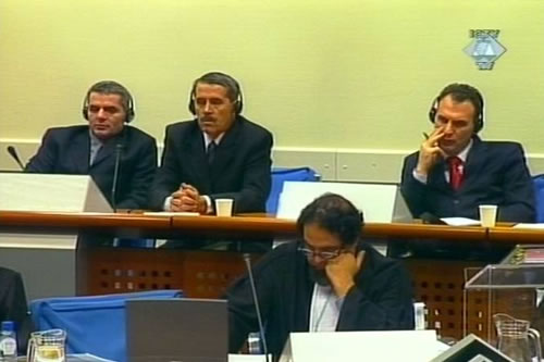 Isak Musliu, Hajradin Bala and Fatmir Limaj in the courtroom