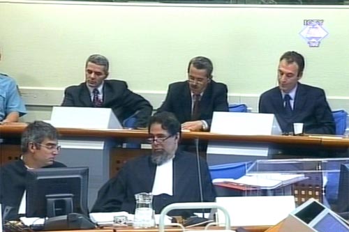 Isak Musliu, Haradin Bala and Fatmir Limaj in the courtroom
